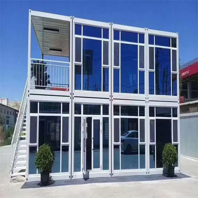 Casa de contenedores de paquete plano